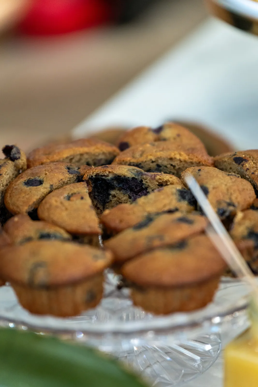 Blueberry muffins on a glass stand