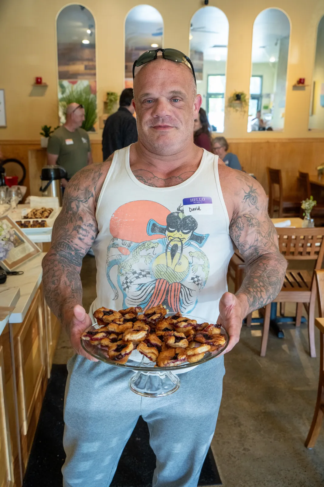 A proud baker shows off his entry
