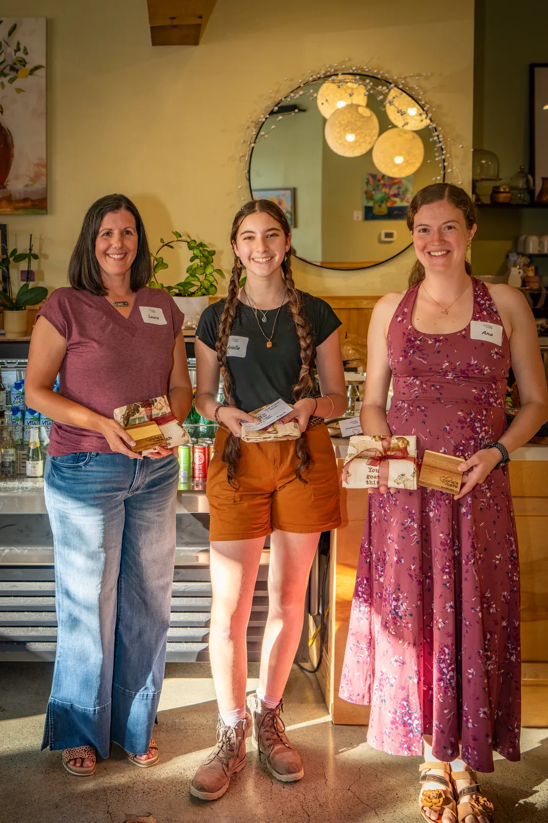 Three bakers pose with their entries