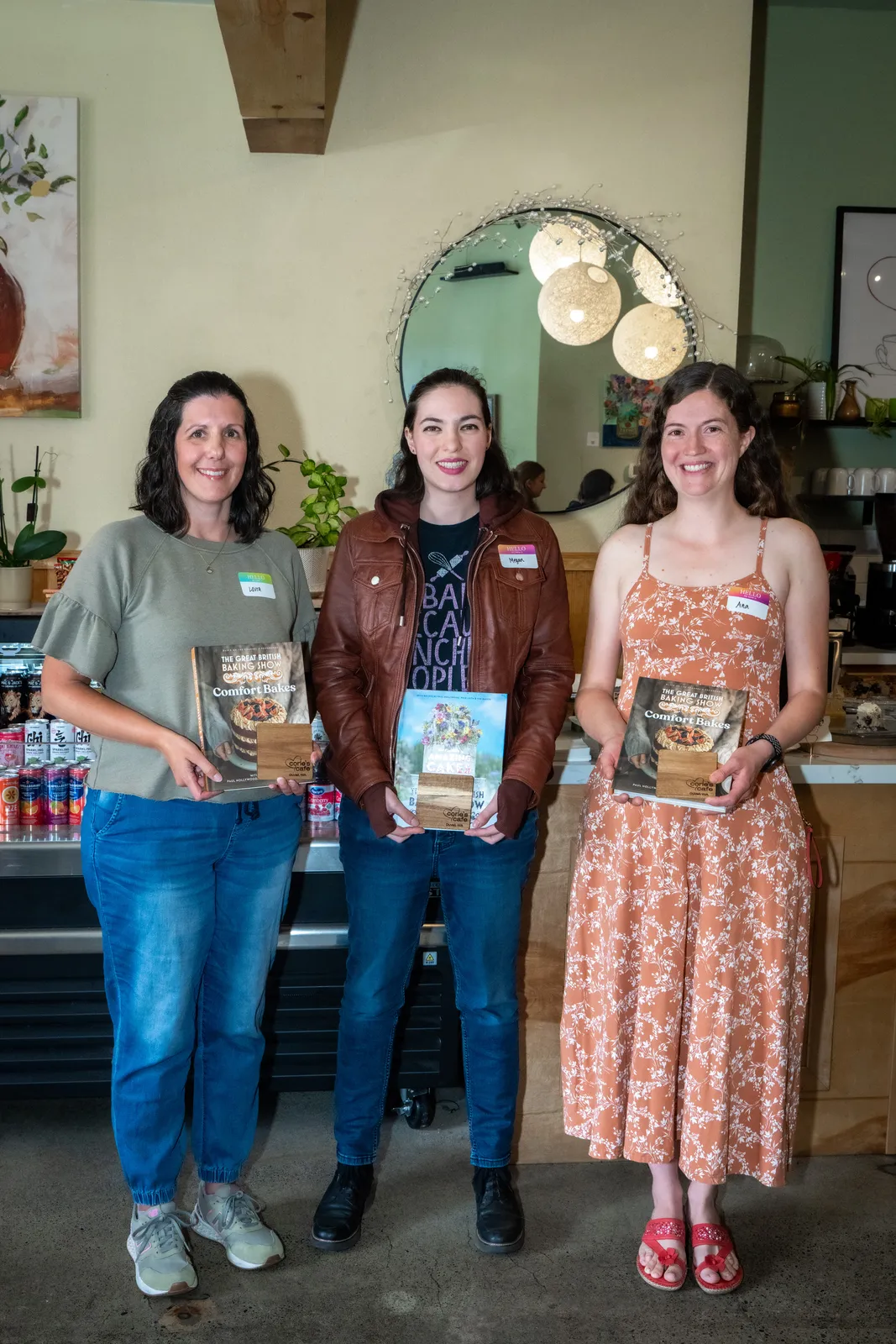 Three bakers showing off their recipes